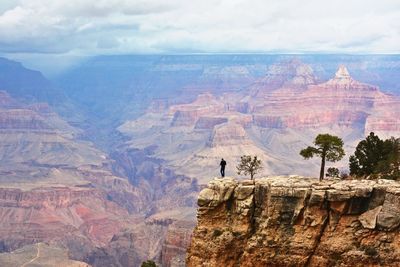 Tourists on rock formation