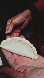 Close-up of man preparing food