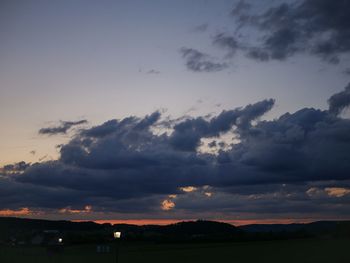 Scenic view of dramatic sky during sunset