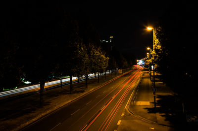 Light trails on city street at night