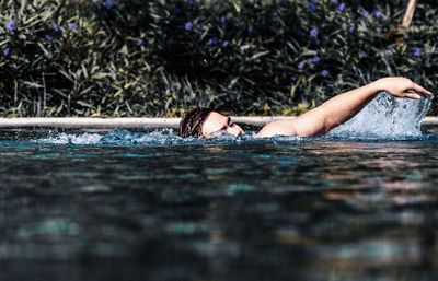 Man swimming in lake