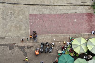 High angle view of market stalls on sidewalk