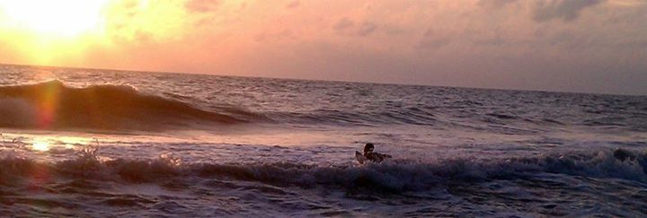 Scenic view of sea at sunset