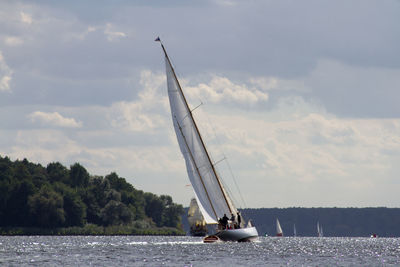 Sailboats sailing on lake in germany