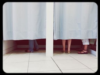 Close-up of woman standing in pond