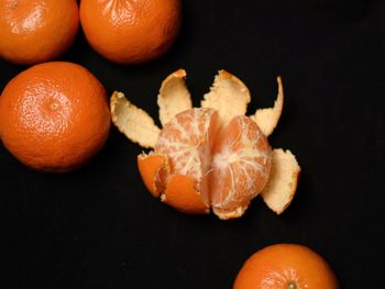 Close-up of oranges against black background