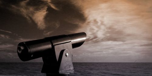 View of viewer at sea against cloudy sky