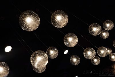 Low angle view of illuminated light bulb