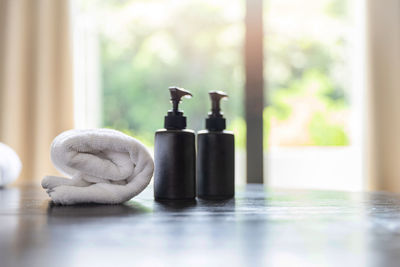 Close-up of bottles on table