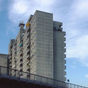 Low angle view of skyscraper against sky