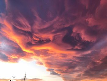 Low angle view of dramatic sky during sunset