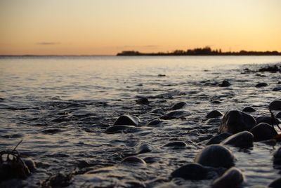 View of calm sea at sunset