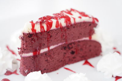 Close-up of cake against white background