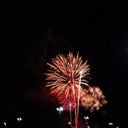 Low angle view of firework display