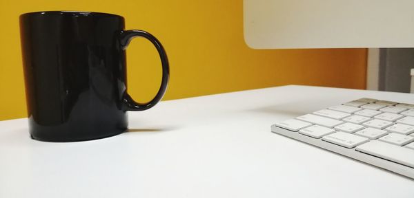 Coffee cup on table