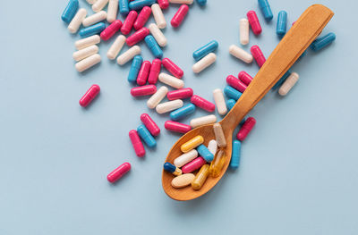 High angle view of pills on white background