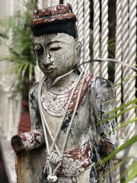 Close-up of statue against temple