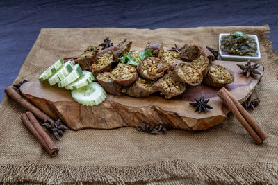 High angle view of bread on cutting board