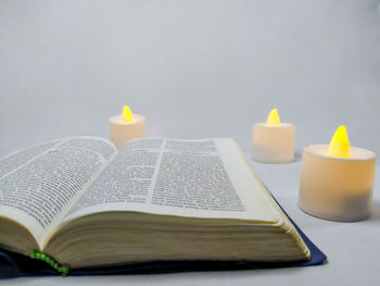 Close-up of candles on table