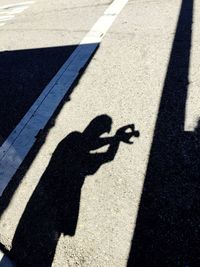 High angle view of shadow on road