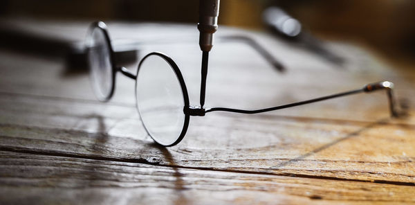 Close-up of eyeglasses on table