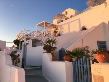 Residential buildings against blue sky