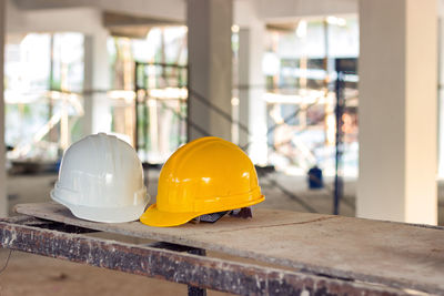 Hardhats on table in old building