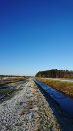 Road against clear sky