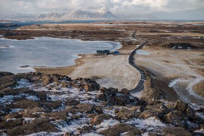 Scenic view of land against sky during winter