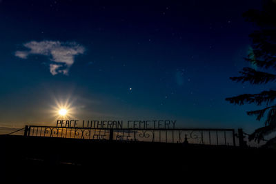 Scenic view of silhouette landscape against sky at night