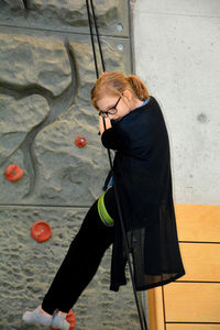 A girl on a climbing wall