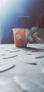 Close-up of coffee cup on table