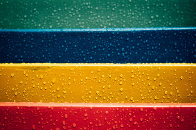 Full frame shot of wet colorful steps