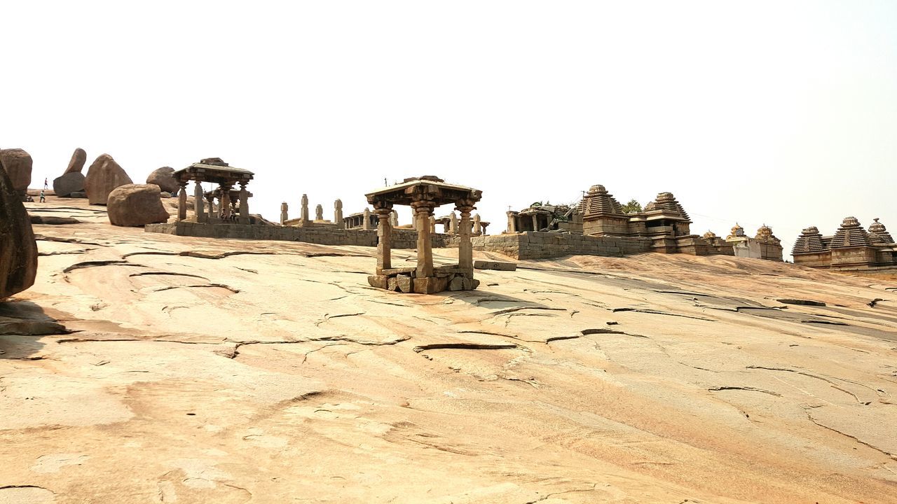 clear sky, old ruin, ancient, built structure, ancient civilization, history, architecture, copy space, desert, the past, rock formation, travel destinations, arid climate, landscape, tranquility, archaeology, famous place, tourism, travel, old