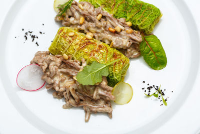 High angle view of vegetables in plate on table