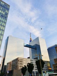 Low angle view of modern buildings against sky