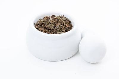 Close-up of white apple over white background