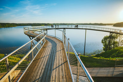 Bridge over river against sky