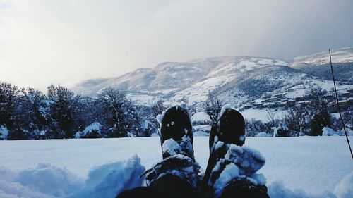 Scenic view of snow covered mountains