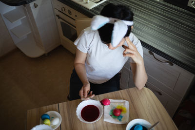 High angle view of boy with dog