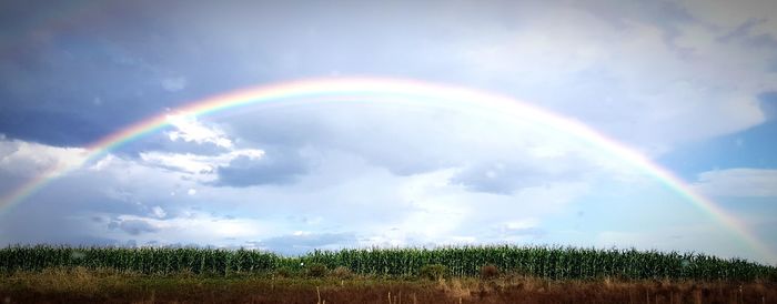 Scenic view of rainbow against sky