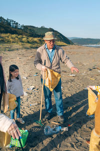 Portrait of people standing outdoors