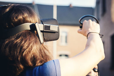 Close-up of woman using virtual reality