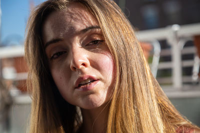 Close-up portrait of a young woman