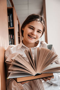 Portrait of a smiling young woman