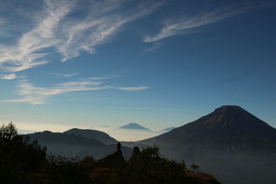 Scenic view of mountains against sky during sunset