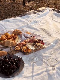 High angle view of grapes in plate on table