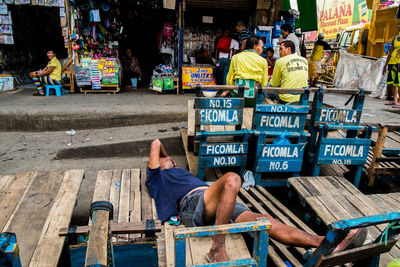 People at market stall