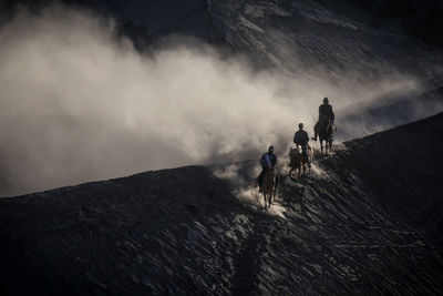 People walking on mountain