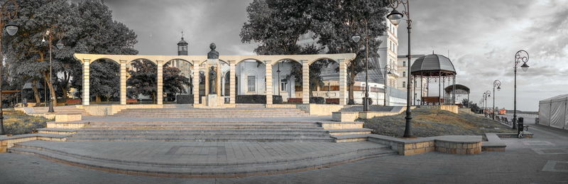 Panoramic view of temple and building against sky